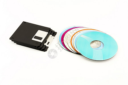 1 44英寸软盘和CD/DVD磁盘在白色的反面图片