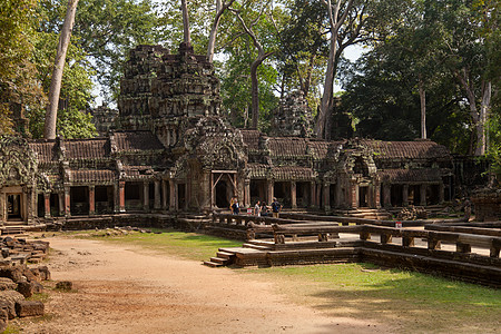 柬埔寨吴哥渡寺古老美丽的雕刻建筑和网关 柬埔寨雕像寺庙旅行高棉语树木丛林建筑学树根和尚旅游图片