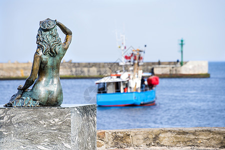 波兰斯托尔普穆安德州乌斯特卡美人鱼旅行女士雕像女性地标岩石纪念碑石头入口艺术图片