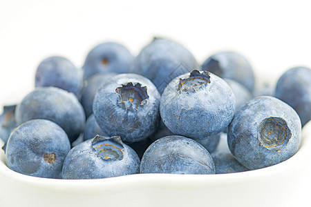 蓝莓营养团体美食水果收成宏观蓝色生产浆果小吃图片