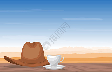 沙漠景观视图中的一杯茶和牛仔帽插图图片