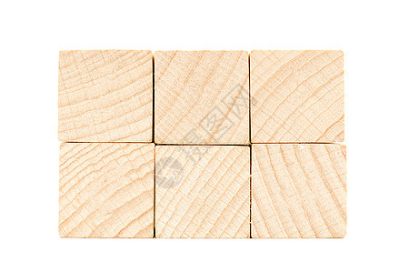 白色背景上的木制立方体游戏正方形玩具黄色木头盒子图片