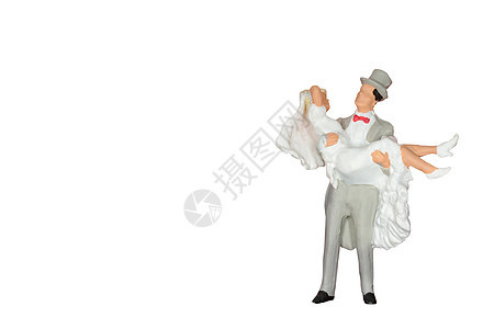 迷你人 新娘和新郎在白色上被孤立背景图片