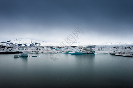 冰川环礁湖的冰山暴风雪气候温度蓝色冰川旅游天空地貌峡湾旅行图片