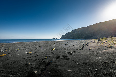 冰岛附近的维克海滩海岸蓝色天空旅行海岸线天气沿海太阳海浪支撑图片