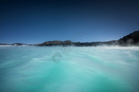 冰岛蓝色环礁湖矿物质晴天太阳天空旅行蓝色娱乐旅游地标火山图片