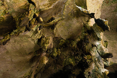 躲到洞穴前 古老的石头洞洞石和stalagmites旅行石灰石洞穴学入口地标岩石石窟公园矿物隧道图片