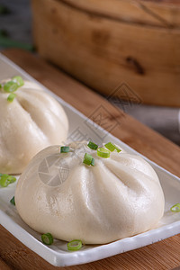 美味的罗吉 中国蒸烤肉包 可以吃在沙皇上了馅料产品饮茶美食木头饺子早餐餐厅盘子食物图片