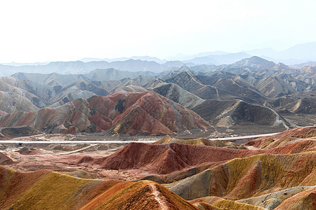 中国亚山地公园的彩虹山脉首脑砂岩条纹岩石风景旅行地貌地形丹霞场景图片