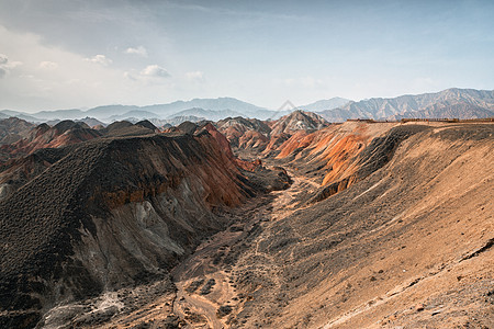 中国亚山地公园的彩虹山脉旅行风景远足砂岩沙漠悬崖顶峰地形条纹地貌图片