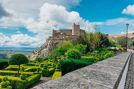 葡萄牙Alentejo地区的花园和中世纪城堡全景旅行历史性蓝色石头墙壁村庄爬坡地标遗产天空图片