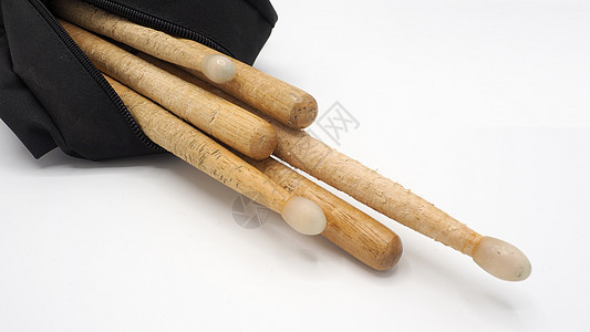 用实木材料制成的鼓棒工作室黑色音乐鼓袋压缩手袋齿轮乐器鼓手木头图片