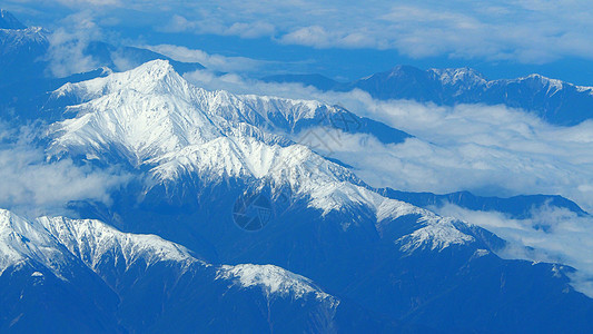 东藤山周围雪丘的顶角图像冰川顶峰旅游风景爬坡道山脉雪山天空岩石白色图片