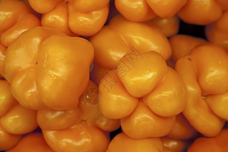 橙色胡椒水果沙漠健康饮食市场特价蔬菜展示特写棕榈摊位图片