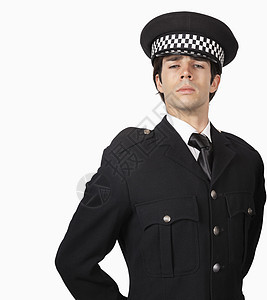 在白种背景下对自信的警官的一幅肖像图片