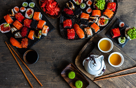寿司 生生和寿司胶卷贴在石板上大豆杯子鳗鱼鱼片食物海鲜环境执事石头筷子图片
