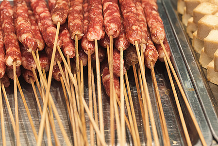 亚洲流浪食品旅行香肠小贩烧烤市场街道图片