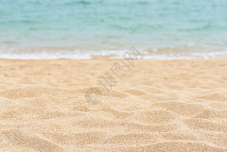 在沙滩上撒沙冲浪背景假期地平线热带海浪旅行质地粮食支撑图片