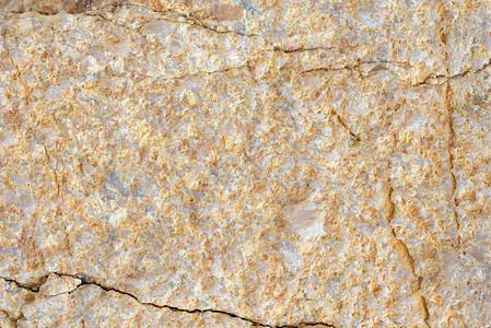 石头表面的纹理裂缝石面岩石背景图片