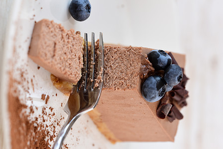 芝士蛋糕和浆果水果奶油庆典巧克力可可糕点食物棕色面包宏观图片
