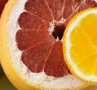 桌上的水果橙子红色黄色图片