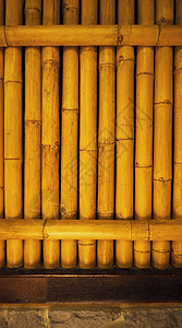古老的肮脏竹子背景墙 从真实的本质黄色风格棕色生长正方形森林园艺木头圆形石头背景图片
