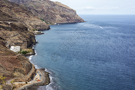 海岸线景观 山地和海面风景图背景图片