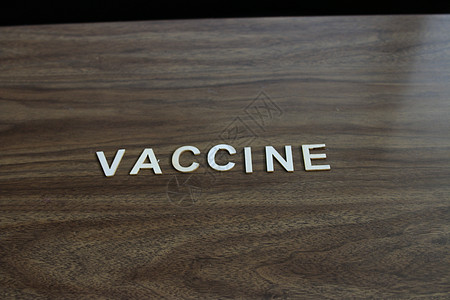 木质背景的疫苗 复制空间的房间病人保健药品流感感染临床治疗医院医疗卫生背景图片