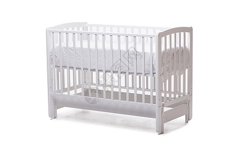 在白色背景上隔离的婴儿床小床图片