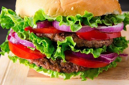 汉堡在面包包中用于营养快餐概念沙拉芝士油炸餐厅烹饪蔬菜午餐垃圾包子炙烤图片