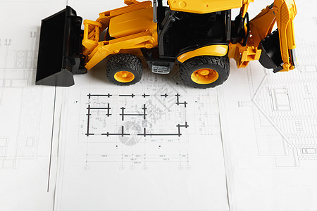 关于住房建筑蓝图的拖拉机玩具装载机房子反铲驾驶建造游戏轮子橡皮孩子橙子图片