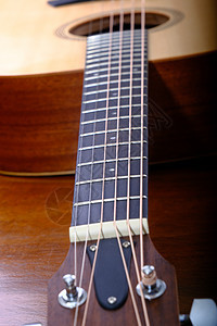 音响吉他棕色音乐声学乐器细绳旋律身体木头指板艺术图片