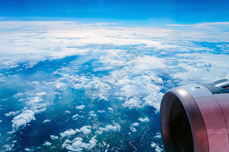 从飞机的窗口视图 F目的地内饰环境旅游陆地商用飞机技术蓝色飞行器天气图片