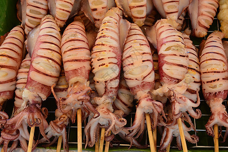 泰国街头食物的灰丝袜海鲜烹饪炙烤烧烤章鱼香蕉店铺小吃动物饮食图片