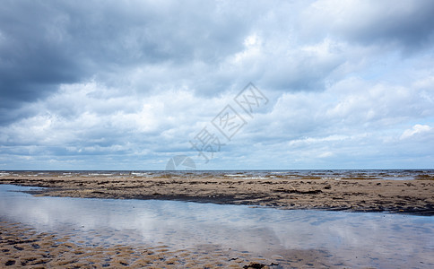 黄海海岸的风景海岸线蓝色海洋多云海岸太阳反射海景天气戏剧性图片