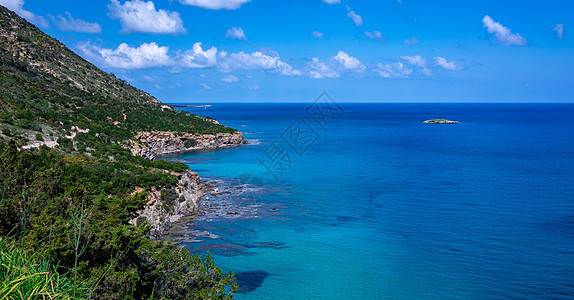 塞浦路斯岛的地貌景观海滩海岸线岩石山脉旅游天空蓝色石头长廊旅行图片