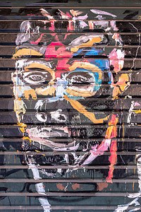 涂鸦艺术作品上的多彩人脸城市悲伤文化滚动建筑棉布黑鬼插图痛苦房子图片