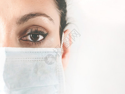 戴保护面罩的女医生治疗医院肺炎药品保健面具卫生女性护士外科图片
