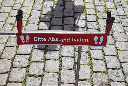 保持德国语言的距离符号  1卫生感染安全暴发社交地面仪表保健封锁人行道图片