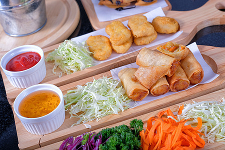 有关食物背景的中国传统  炸鱼春卷文化筷子大豆自助餐餐厅小吃蔬菜烹饪盘子油炸图片