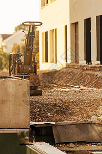 建筑工地上的振动板设备机器压缩建造工程力量道路工作建设压实机图片