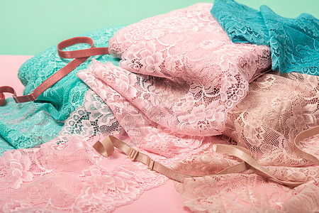 内衣 内裤和粉红背景胸罩的彩色高丰富明亮蕾带织物装饰裁缝爱好收藏手工新娘蕾丝松紧带工艺图片