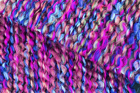 粉色和蓝色羊毛线纹理的宏图片