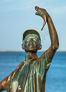 乌克兰Berdyansk渔夫纪念碑旅行纪念碑渔夫街道旅游地方太阳雕塑海滩长廊图片