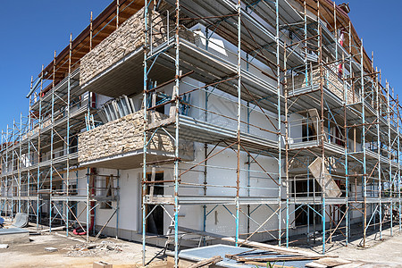 正在建造的新住房财产项目工程构造建设者工作天空水泥建筑学装修图片