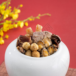 中国月球新年传统食物 佛祖跳过华月桌子黄瓜美食餐厅盘子肠子芋头海鲜鲍鱼节日图片