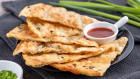 台湾食物  美味的薄片炒菜煎饼平底锅油炸菜单洋葱辣椒馅饼美食服务盘子餐厅背景