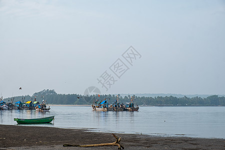 果阿渔民村绳索海滩钓鱼渔船渔业建筑晴天蓝色码头结构图片