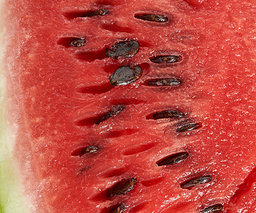 红色成熟西瓜的纹理 满身棕色种子图片