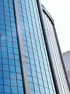 摩天大楼玻璃面罩的碎片框架摄影镜子商业几何学总部倾斜插图马赛克高楼图片